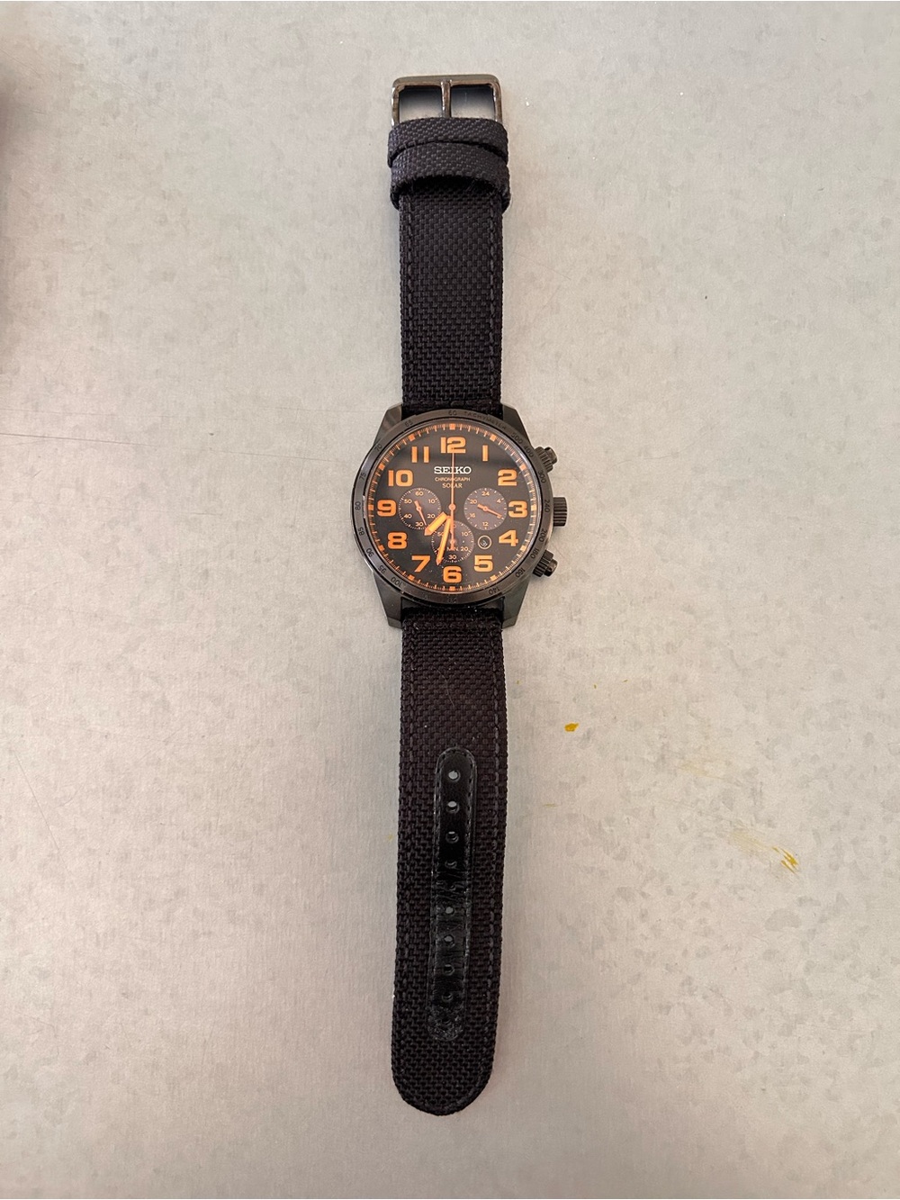 Seiko Men's Black Strap Watch with Orange Accents